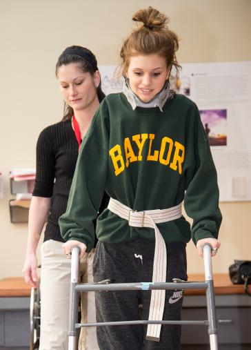 Makenzie Wethington was admitted to Baylor Institute for Rehabilitation in Dallas on January 31 after sustaining injuries during a skydiving accident. Photo: Makenzie during a physical therapy session on Feb. 3, 2014. The physical therapist in the photo is Christina Fazio, PT. 