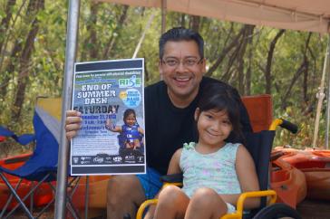 Event Poster Captures Joy of Disabled Child Waterskiing for First Time